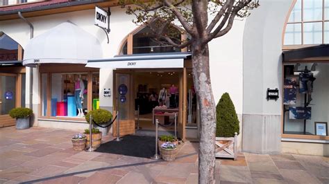 Explore the Levi's boutique at Maasmechelen Village .